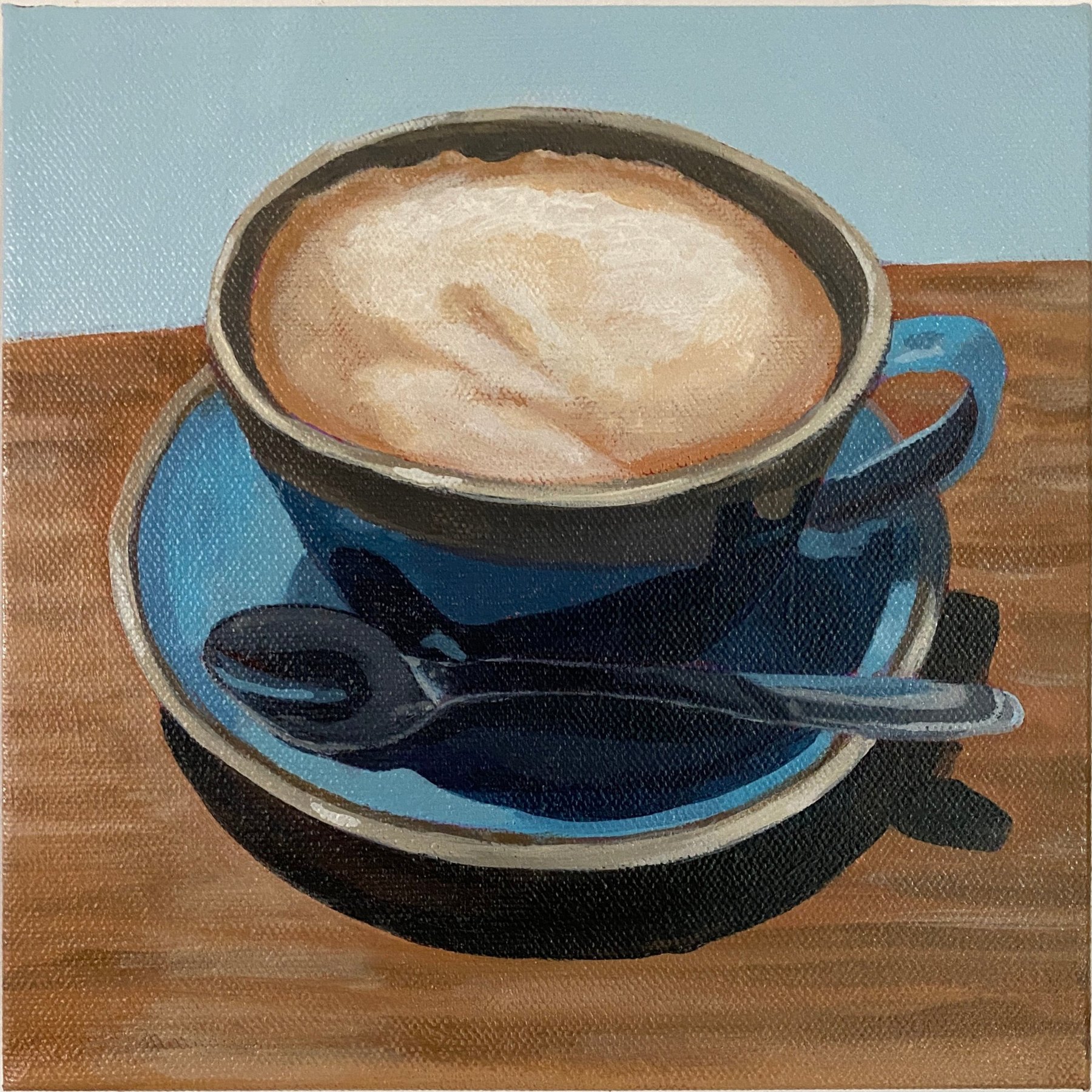 Cappuccino in Blue Cup shown in the Kitchen